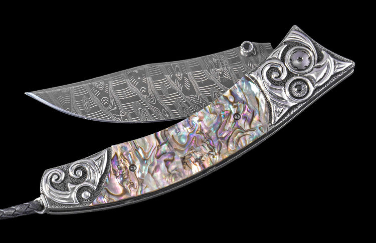 One of a Kind William Henry Custom Knife with Hand-carved sterling silver frame, abalone scales, and damascus steel blade.