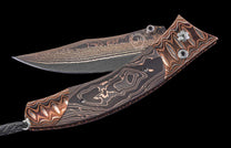 One of a Kind William Henry Custom Knife with Heat-colored 'Wave' Mokume frame, Carbon fiber with copper scales, and a damascus steel blade