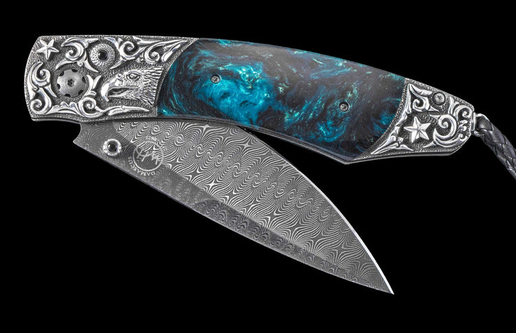 One of a Kind William Henry Custom Knife with Hand-carved sterling silver frame, resin composite scales, and damascus steel blade