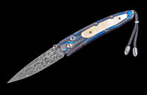  and hand forged damascus steel blade.