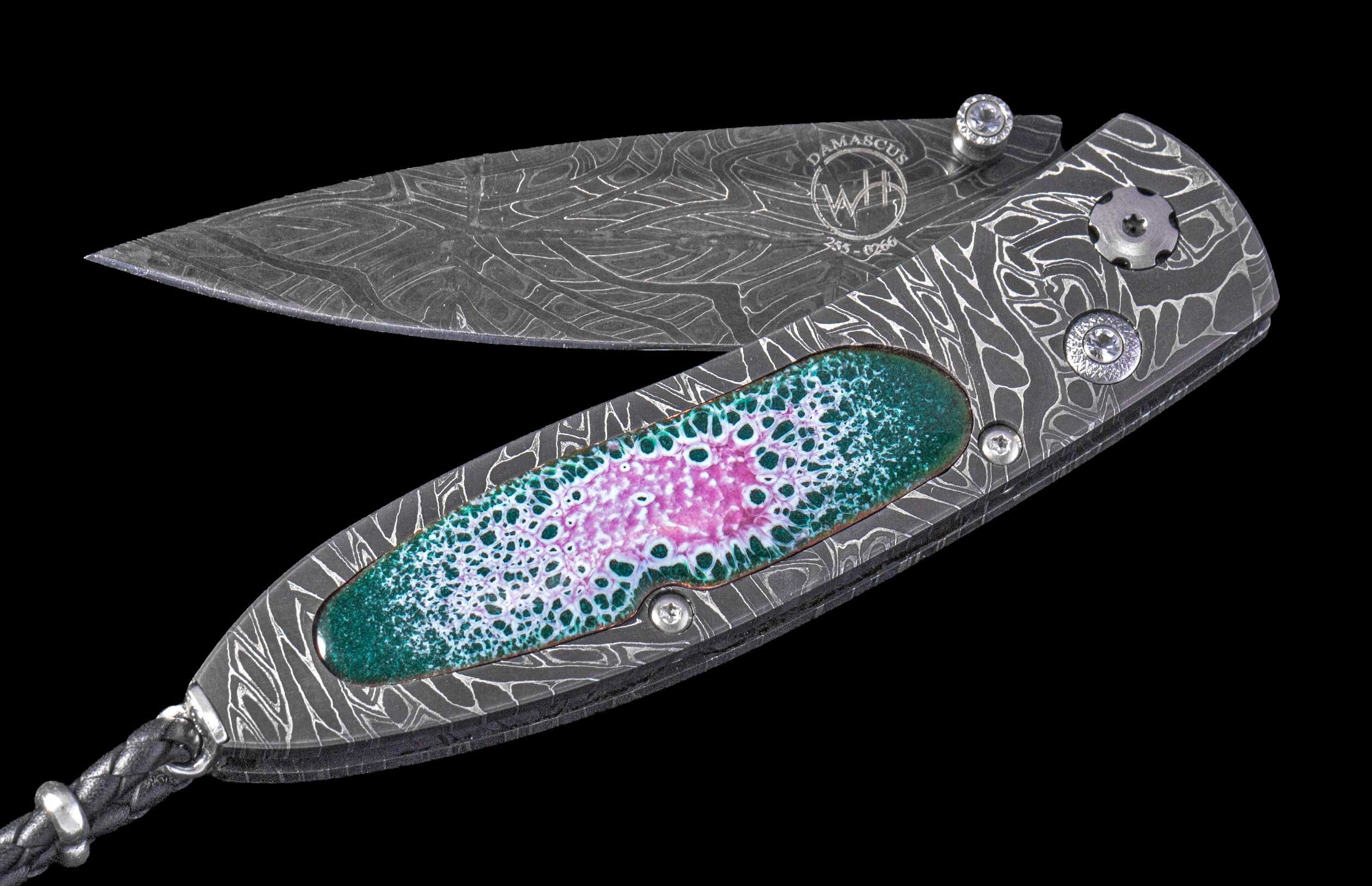 One of a Kind William Henry Custom Knife with damascus frame, enamel scales, White Sapphire gems, and damascus steel blade.