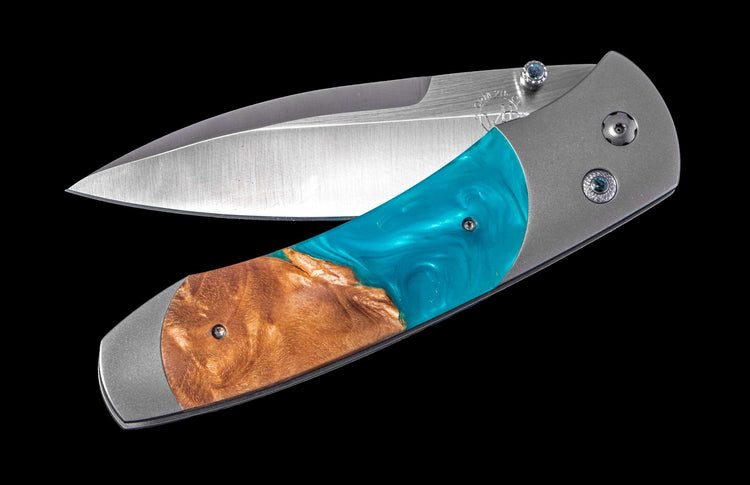 One of a Kind William Henry Custom Knife with titanium frame, wood and resin hybrid scales, Blue topaz gems, and CPM-20 CV blade
