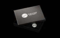 MCW MC BLK|Leather Card & Cash Wallet presented in a textured black gift box featuring William Henry branding and a small 'WH' emblem.