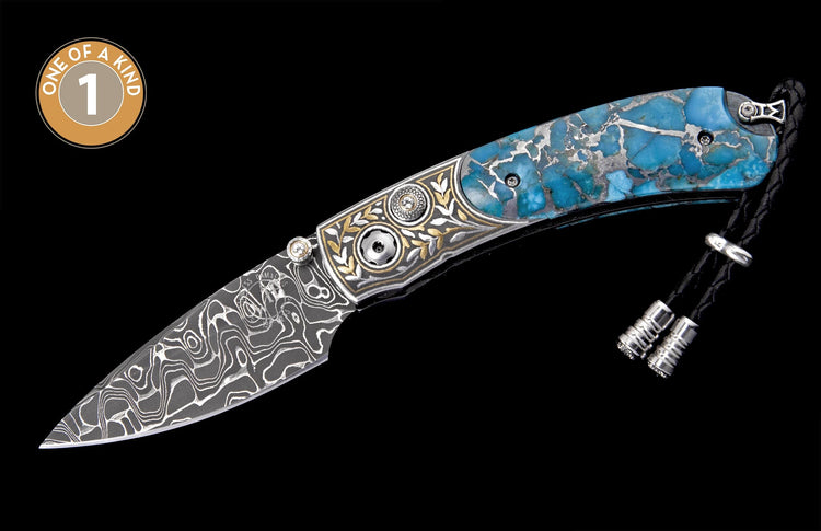 Ornate knife with a Damascus blade, matrix turquoise handle, engraved silver and gold details, and black braided lanyard.