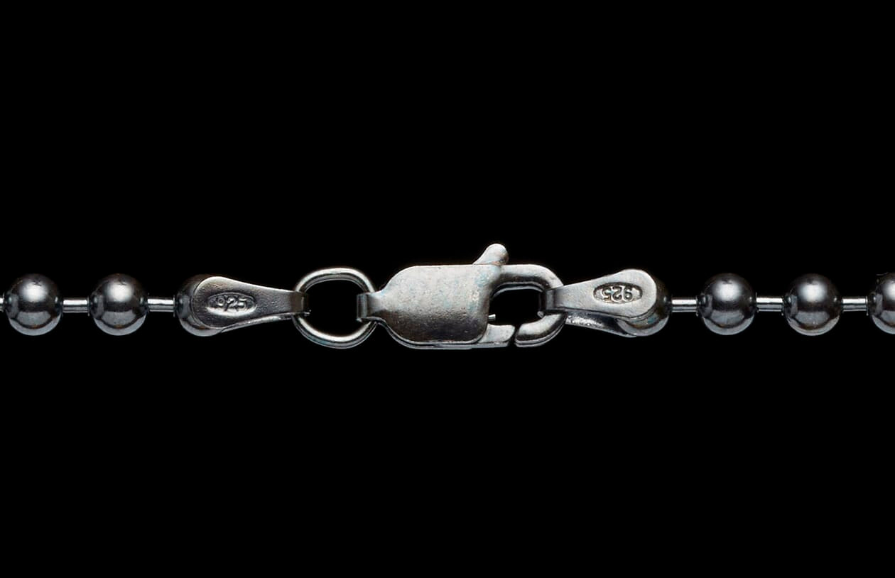 Sterling silver ball chain necklace featuring a lobster clasp with a visible '925' stamp.