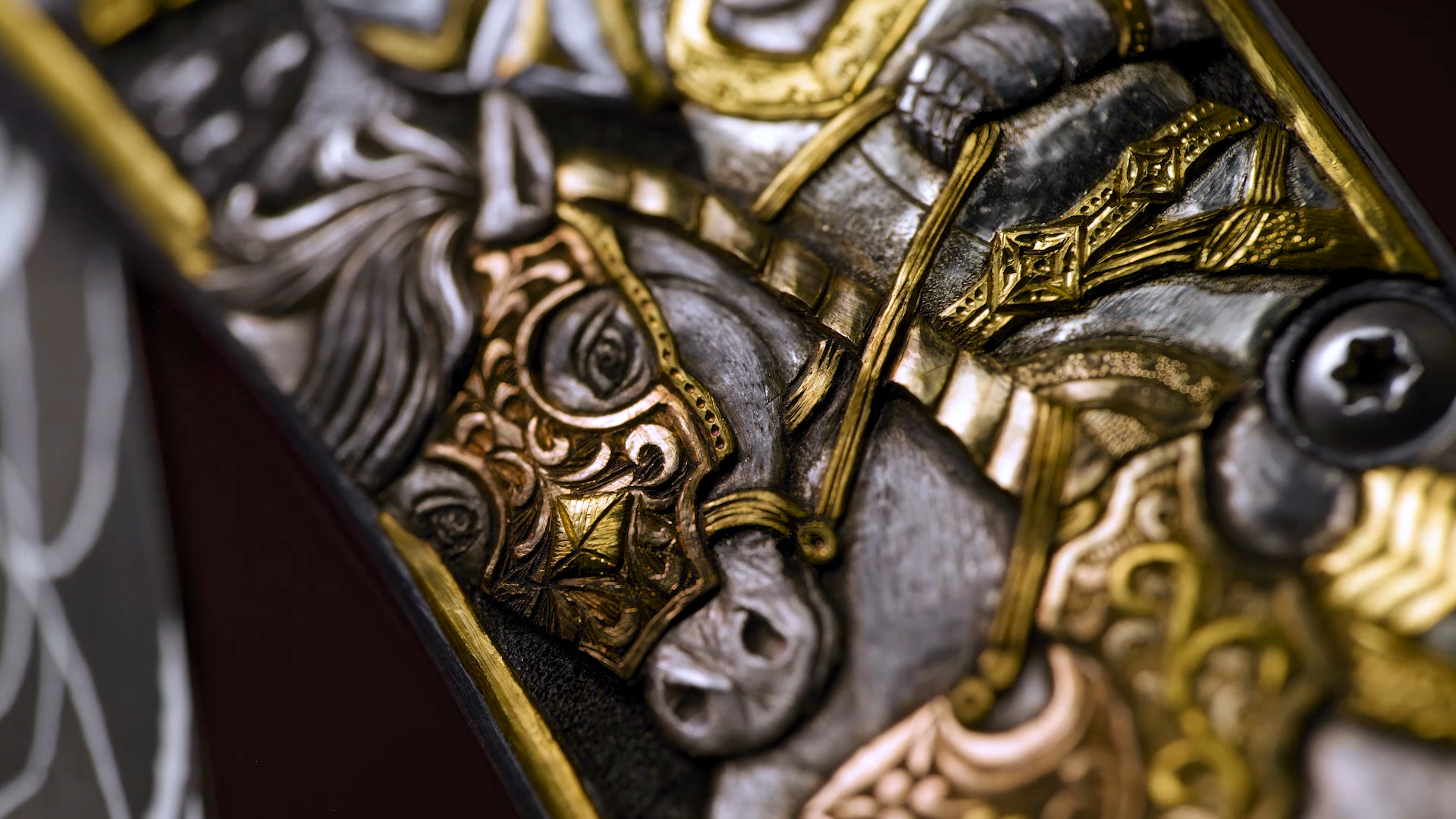 video of elaborate hand engraved William Henry knife depicting medieval knights and dragon