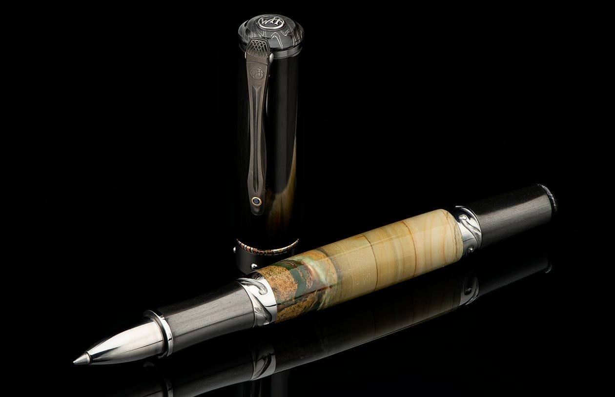 Elegant rollerball pen featuring a natural woodgrain barrel and dark grey cap with metallic accents.