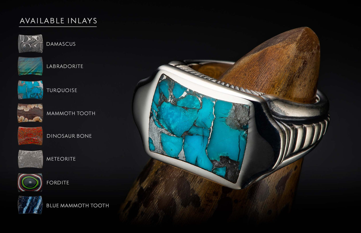 Silver ring with a large, fractured turquoise inlay and textured sides, displayed on a wooden stand.