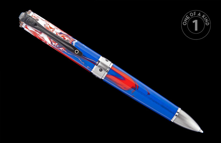 Red, white, and blue marbled pen with a silver-toned clip and metal tip, angled diagonally.
