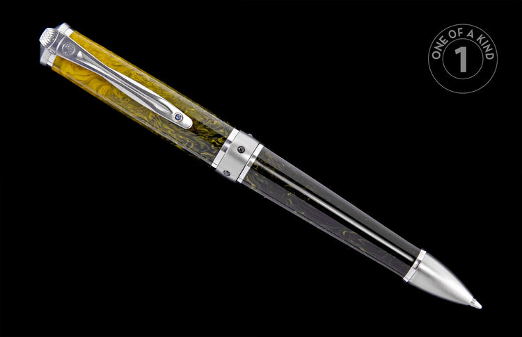Pen with a yellow and black marbled body, silver-toned metal accents, and a blue jewel on its clip.