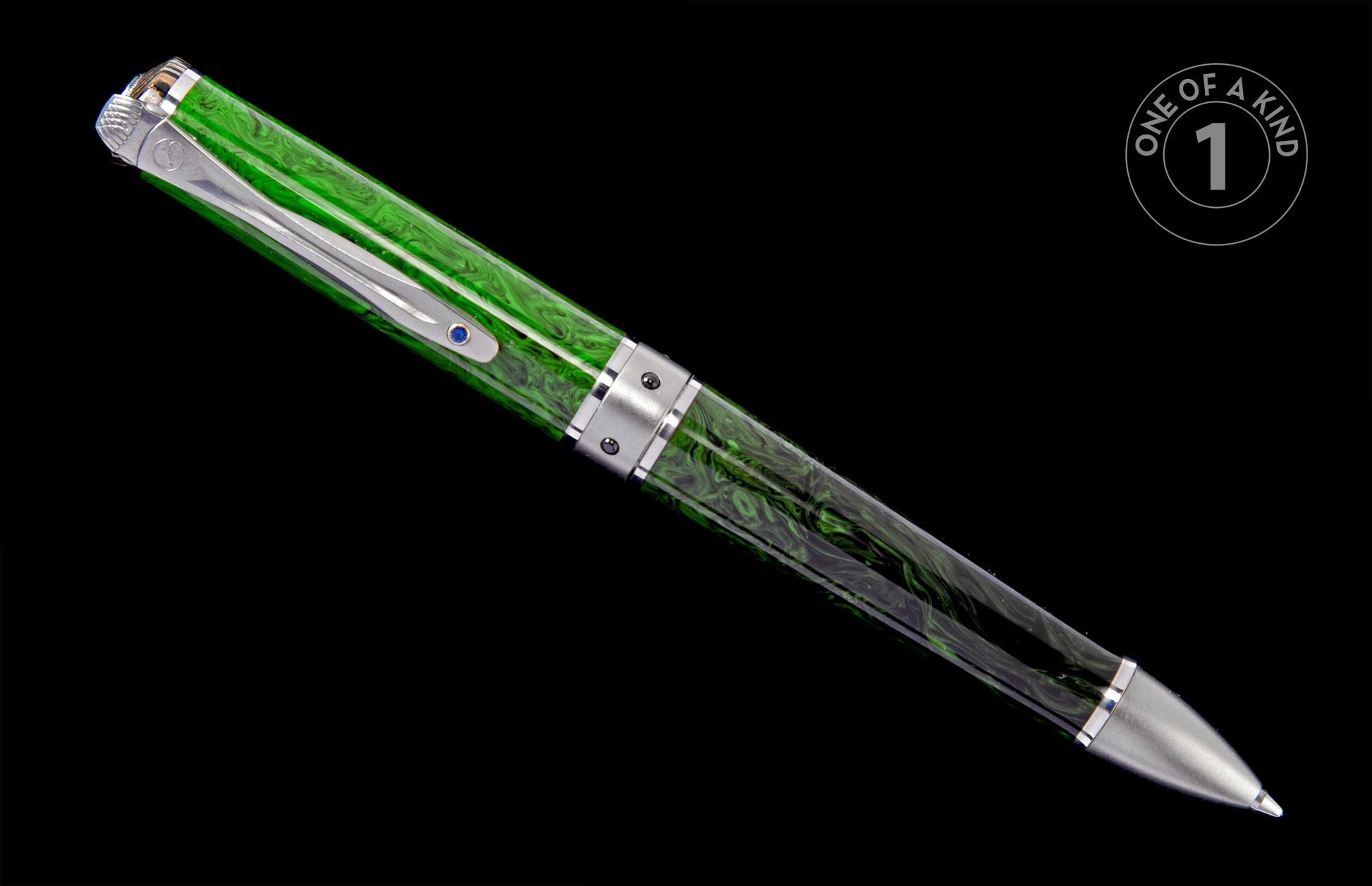 Green marbled pen with silver-toned accents, a blue gem on the clip, and a 'One of a Kind' label.