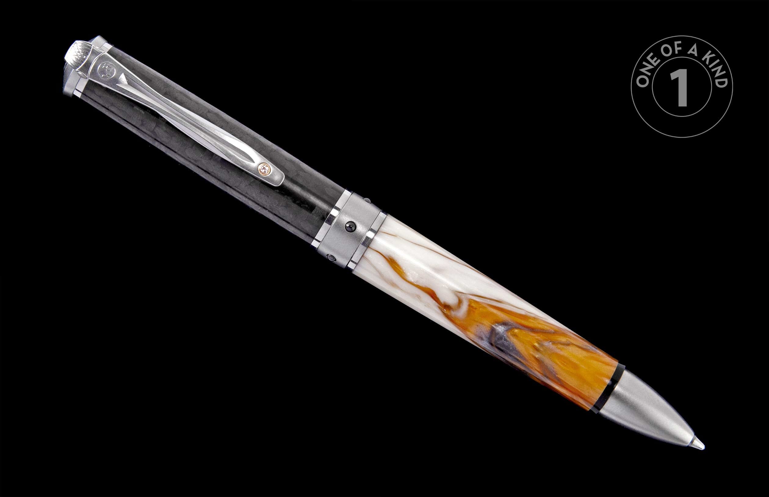 Pen with a dark patterned cap, swirled white and amber resin barrel, and silver-toned hardware featuring a clip jewel.