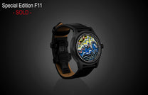 Special Edition Fordite watch by William Henry with vibrant marbled dial, black case, and leather strap, side view on dark background
