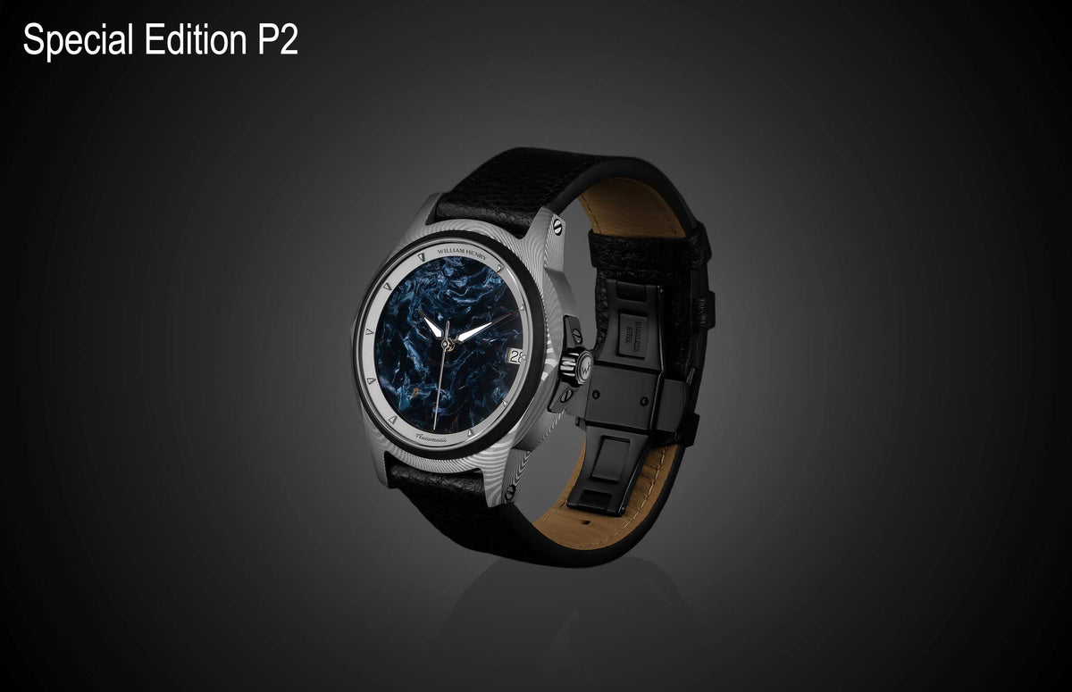 Pietersite dial automatic watch by William Henry with silver-toned case, black leather strap, and textured bezel, side view on dark background