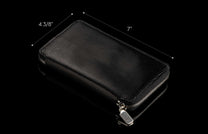 ZW LIZ BLK MT|Large black leather zipper wallet with a scaly texture, silver-toned zipper, measuring 7 inches by 4 3/8 inches.